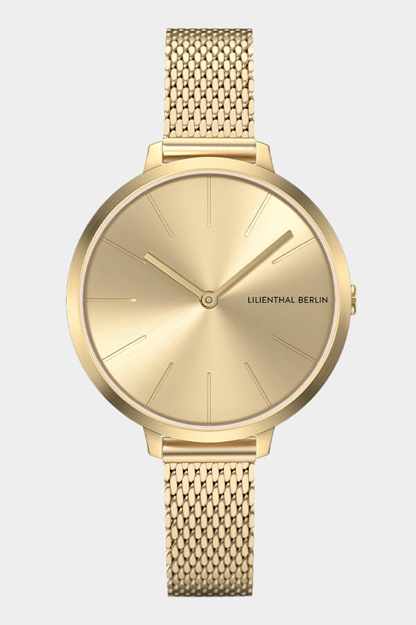 Women's gold mesh band watch hotsell